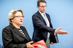 German Transportation Minister Andreas Scheuer, right, and German Environment Minister Svenja Schulze, left, arrive for a news conference in Berlin, Wednesday, Oct. 2, 2018.