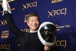 Zozo Chief Executive Yusaku Maezawa poses for the media prior to his news conference in Tokyo, Tuesday, Oct. 9, 2018.