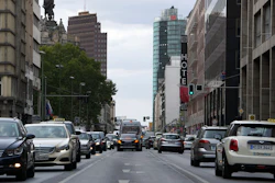 In this Tuesday, Aug. 28, 2018 photo cars drive on the 'Leipziger Strasse' towards the Potsdamer Platz in Berlin, Germany.