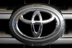 This Feb. 11, 2016, file photo shows a Toyota logo on the hood of a 2016 Toyota Sequoia on display at the Pittsburgh International Auto Show in Pittsburgh.