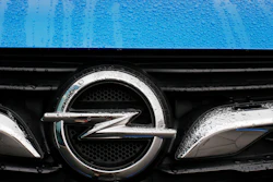 This Thursday, Nov. 9, 2017 file photo shows an Opel logo of an Opel Grandland at the Opel headquarters in Ruesselsheim, Germany.