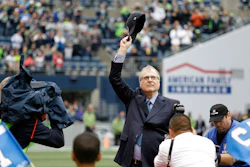 In this Sept. 17, 2017 photo, Seattle Seahawks owner Paul Allen waves as he is honored for his 20 years of team ownership.