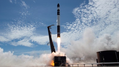 In this Jan 21, 2018, file photo provided by Rocket Lab, an electron rocket carrying only a small payload of about 150 kilograms lifts off from the Mahia Peninsula on New Zealand's North Island's east coast.