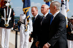 In this Aug. 9, 2018 file photo, Vice President Mike Pence, center, is greeted by Deputy Secretary of Defense Pat Shanahan, left, and Secretary of Defense Jim Mattis before speaking at an event on the creation of a United States Space Force at the Pentagon.