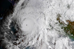 This GOES East satellite image provided by NOAA shows Hurricane Willa in the eastern Pacific, on a path toward Mexico's Pacific coast on Monday, Oct. 22, 2018.