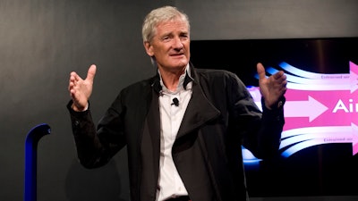 In this Wednesday, Sept., 14, 2011 file photo, inventor James Dyson launches the Dyson DC41 Ball vacuum and the Dyson Hot heater fan on in New York.