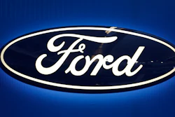 This Feb. 11, 2016, file photo shows the Ford logo on display at the Pittsburgh International Auto Show in Pittsburgh.
