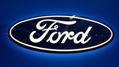 This Feb. 11, 2016, file photo shows the Ford logo on display at the Pittsburgh International Auto Show in Pittsburgh.
