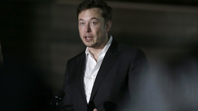 In this June 14, 2018 photo Tesla CEO and founder of the Boring Company Elon Musk speaks at a news conference in Chicago.
