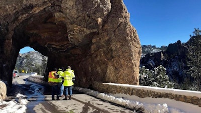 A team from the South Dakota Department of Transportation inspects Hood Tunnel on Needles Highway, just below Sylvan Lake in South Dakota, Monday, Oct. 15, 2018.