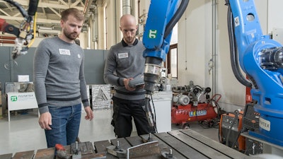 Researchers from SPbPU working on a neural network for 3D printing.