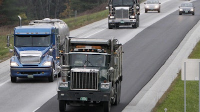 This Oct. 19, 2011 file photo shows trucks traveling on Interstate 89 in Berlin, Vt.