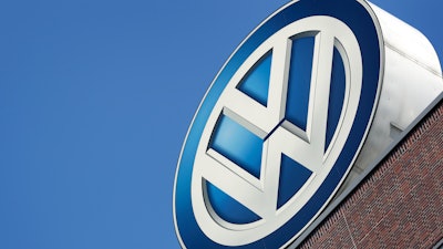 In this Wednesday, Aug. 1, 2018 file photo, the logo of Volkswagen is seen on top of a company building in Wolfsburg, Germany.