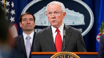 Attorney General Jeff Sessions speaks during a news conference to announce a criminal law enforcement action involving China, at the Department of Justice in Washington, Thursday, Nov. 1, 2018.