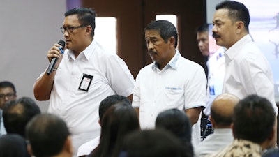 Director of Safety and Security of Lion Air Daniel Putut Kuncoro Adi talks to relatives of the victims of the crashed Lion Air jet during a press conference in Jakarta.