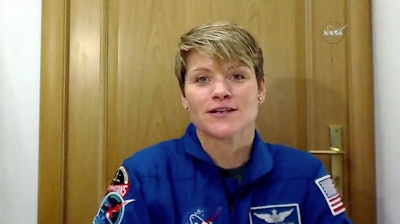 In this image from video made available by NASA, U.S. astronaut Anne McClain speaks during an interview in Star City, Russia on Friday, Nov. 9, 2018.