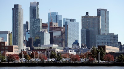 In this Wednesday, Nov. 7, 2018, photo, the Long Island City waterfront and skyline are shown in the Queens borough of New York.