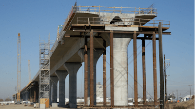 This Dec. 6, 2017, file photo shows one of the elevated sections of the high-speed rail under construction in Fresno, Calif.