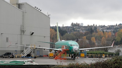 In this Nov. 14, 2018, file photo, a Boeing 737-MAX 8 is parked outside Boeing Co.'s 737 assembly facility in Renton, Wash.