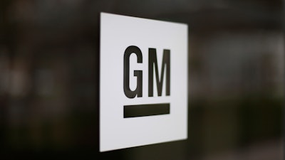 This May 16, 2014, file photo, shows the General Motors logo at the company's world headquarters in Detroit.