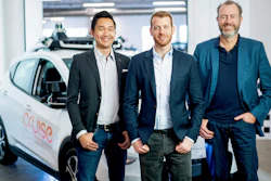 In this Nov. 20, 2018, Cruise Automation's Dan Kan and Kyle Vogt pose for a photo with General Motors' Dan Ammann at Cruise Automation offices in San Francisco.