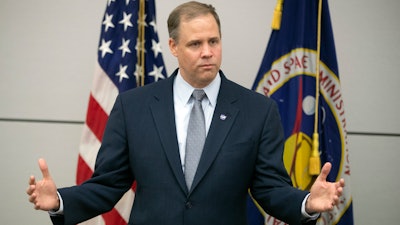 In this Oct. 12, 2018 file photo, NASA Administrator Jim Bridenstine speaks during a news conference at the U.S. Embassy in Moscow.
