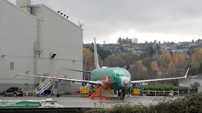 In this Nov. 14, 2018, file photo a Boeing 737-MAX 8 is parked outside Boeing Co.'s 737 assembly facility in Renton, Wash.
