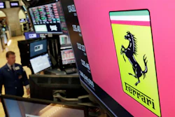 The logo for Ferrari is displayed above a trading post on the floor of the New York Stock Exchange, Wednesday, Aug. 1, 2018.
