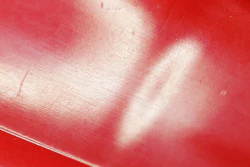 Sink marks occur where thicker and thinner wall sections meet.