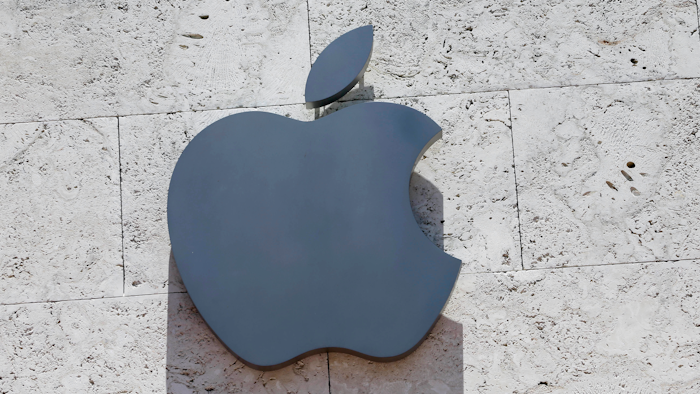 In this Aug. 8, 2017, file photo, the Apple logo is shown at a store in Miami Beach, Fla.
