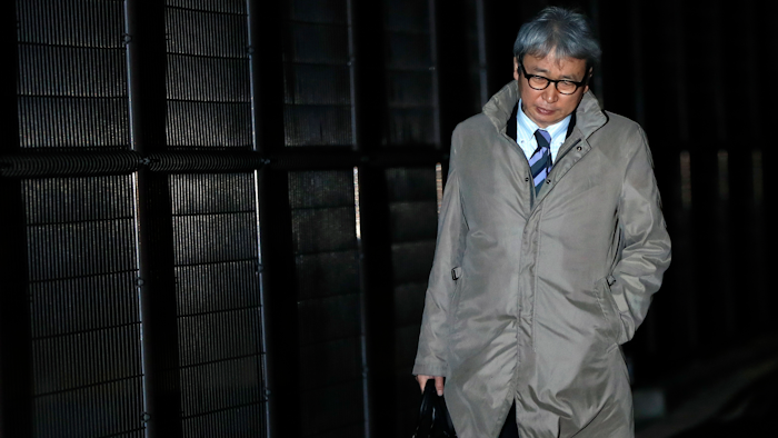 Motonari Otsuru, defense lawyer of former Nissan chairman Carlos Ghosn, leaves from Tokyo Detention Center, Thursday, Dec. 20, 2018.
