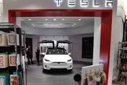 A Tesla Model X vehicle is shown at a gallery showroom in the Nordstrom department store in Troy, Mich., in 2016.