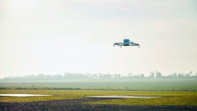 This Dec. 7, 2016, file photo provided by Amazon shows an Amazon Prime Air drone in Cambridgeshire, U.K.