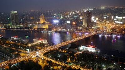 In this Tuesday, May 5, 2015 file photo, rush hour traffic fills the 6 October bridge over the Nile River in Cairo.