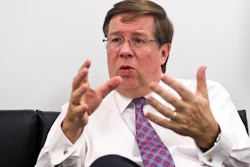 In this Jan. 11, 2016, file photo, Toyota North America CEO Jim Lentz speaks during an interview at the North American International Auto Show in Detroit.
