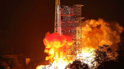 In this photo released by Xinhua News Agency, the Chang'e 4 lunar probe launches from the the Xichang Satellite Launch Center.