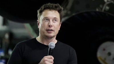 In this Sept. 17, 2018, file photo, Elon Musk speaks in Hawthorne, Calif.