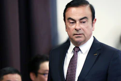 In this May 12, 2016, photo, then Nissan Motor Co. President and CEO Carlos Ghosn attends a joint press conference with Mitsubishi Motors Corp. in Yokohama.
