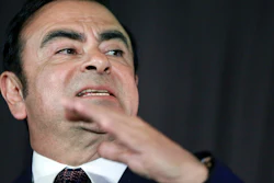 In this May 12, 2016, photo, then Nissan Motor Co. President and CEO Carlos Ghosn speaks during a joint press conference with Mitsubishi Motors Corp. in Yokohama.