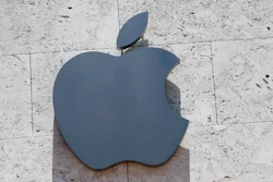 In this Aug. 8, 2017, file photo, the Apple logo is shown at a store in Miami Beach, Fla.