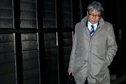 Motonari Otsuru, defense lawyer of former Nissan chairman Carlos Ghosn, leaves from Tokyo Detention Center, Thursday, Dec. 20, 2018.