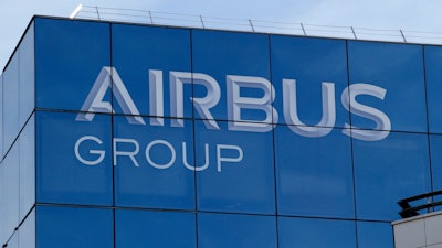 In this May 6, 2016 file photo, the logo of the Airbus Group is pictured in Suresnes, outside Paris.