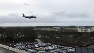 A plane comes in to land at Gatwick Airport in England, Friday, Dec. 21, 2018.