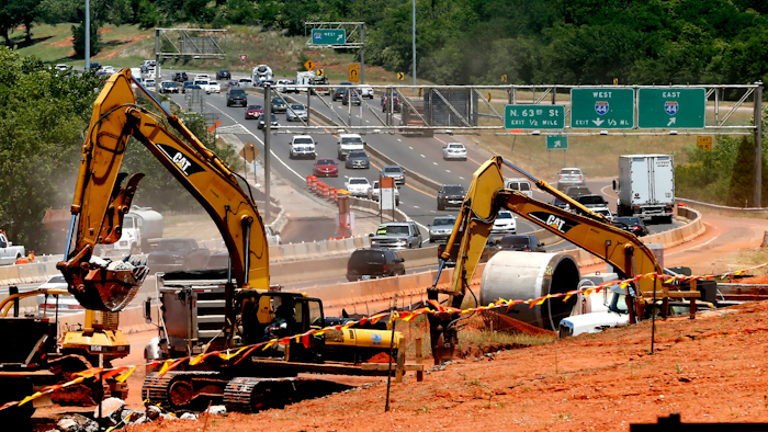 In this May 31, 2017 photo, traffic travels along Interstate 235 near a construction project in Oklahoma City, Okla.