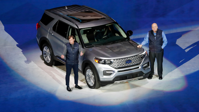 Ford Motor Co. President, Global Markets Jim Farley and President and CEO Jim Hackett stand next to the redesigned 2020 Ford Explorer, Wednesday, Jan. 9, 2019, in Detroit.