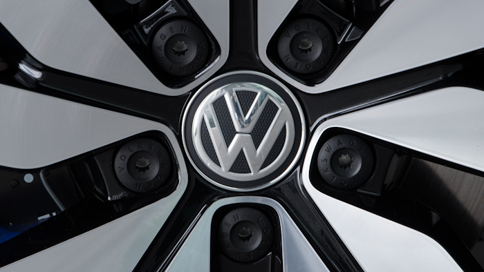 In this April 28, 2017 file photo an e-Golf electric car with the VW logo on a rim is pictured in Dresden.