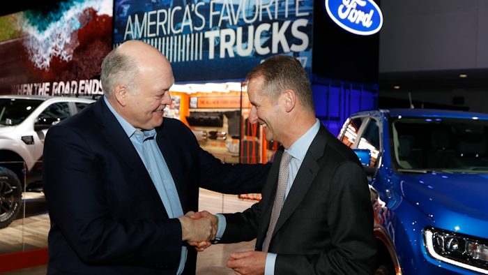 Ford President and CEO Jim Hackett, left, meets with Dr. Herbert Diess, CEO of Volkswagen AG, Monday, Jan. 14, 2019, in Detroit.