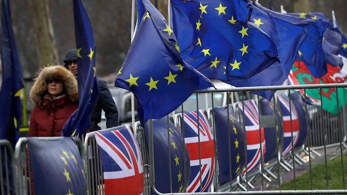 Flags tied to railings outside parliament in London, Thursday, Jan. 24, 2019.