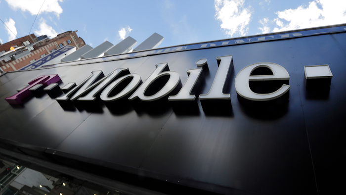 This Wednesday, Oct. 14, 2015, file photo shows a T-Mobile store in New York.