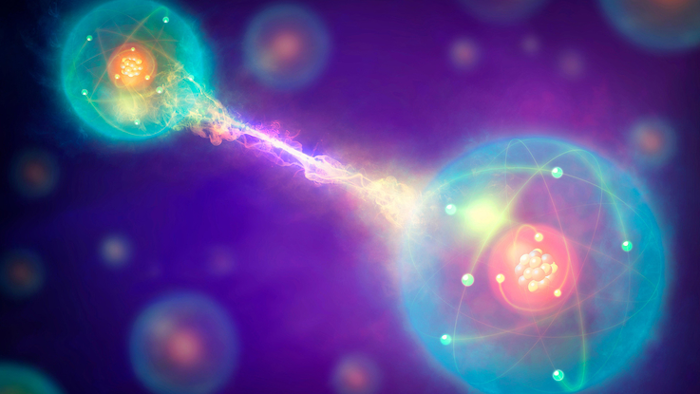Conceptual artwork of a pair of entangled quantum particles interacting.